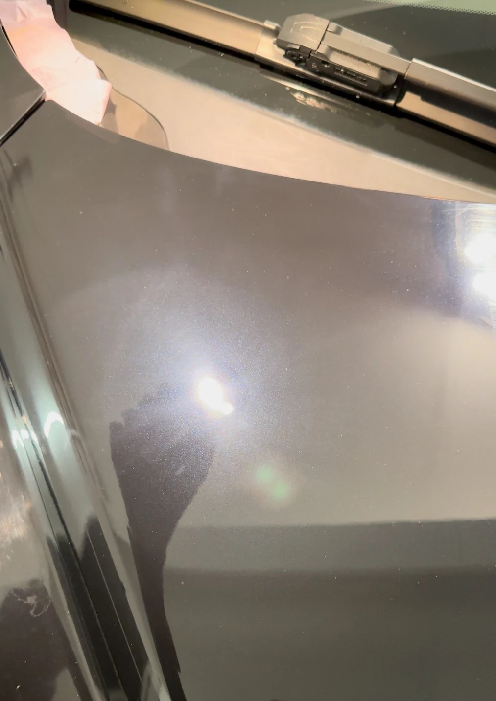 Vehicle paint after ceramic coating, showing a smooth, glossy, corrected finish