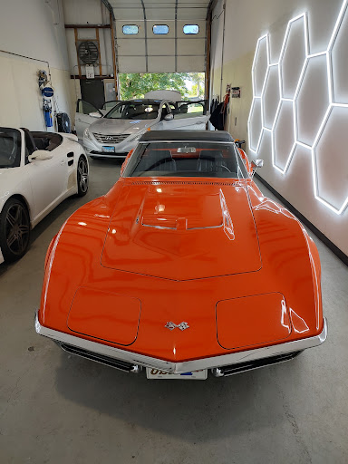 Orange Corvette with corrected paint at Detail Tech