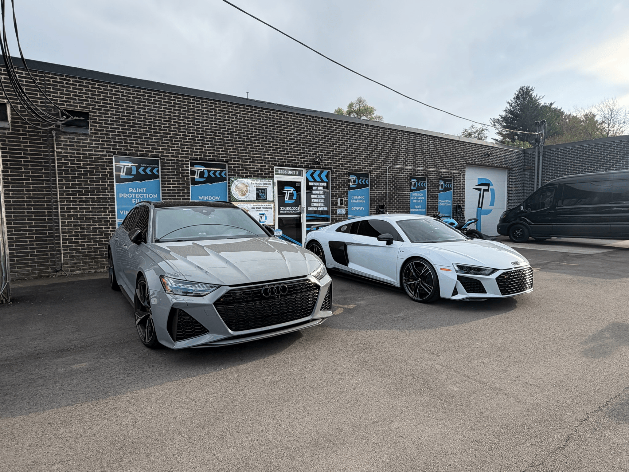 Audi RS6 and R8 parked outside the Detail Tech shop in Crystal Lake, IL