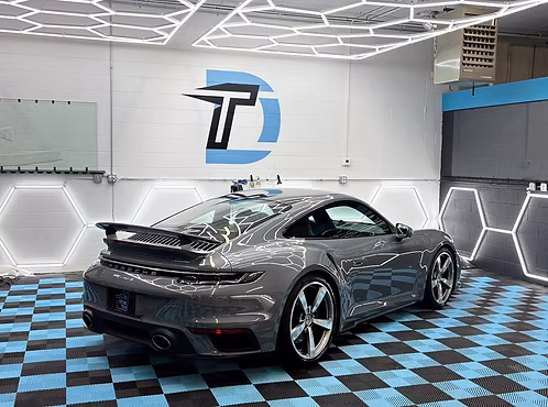 Detailed grey Porsche 911 in the Detail Tech shop
