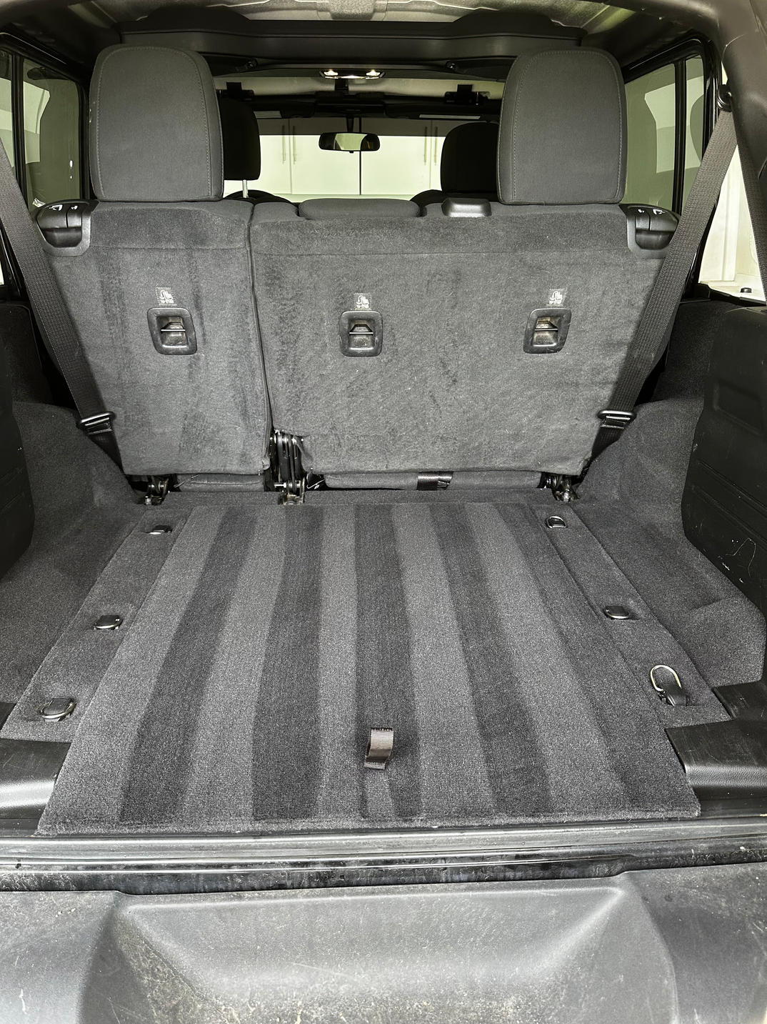 Jeep Wrangler cargo area after detailing, shampooed and clean