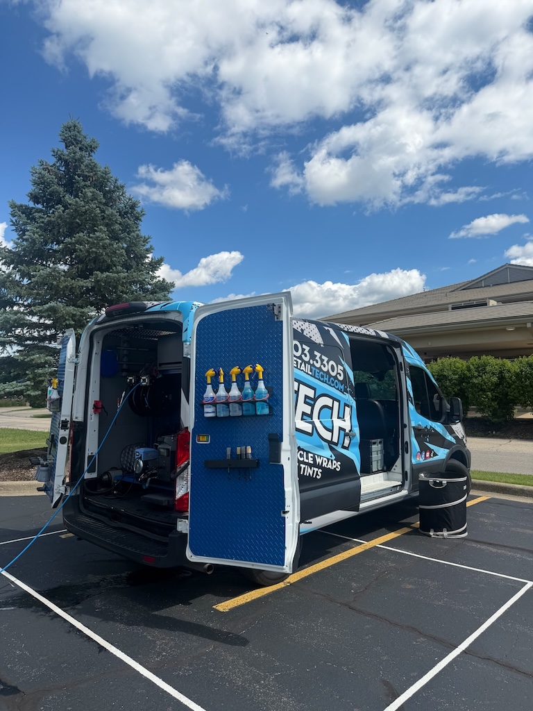 Detail Tech mobile detailing van with rear doors open and equipment loaded