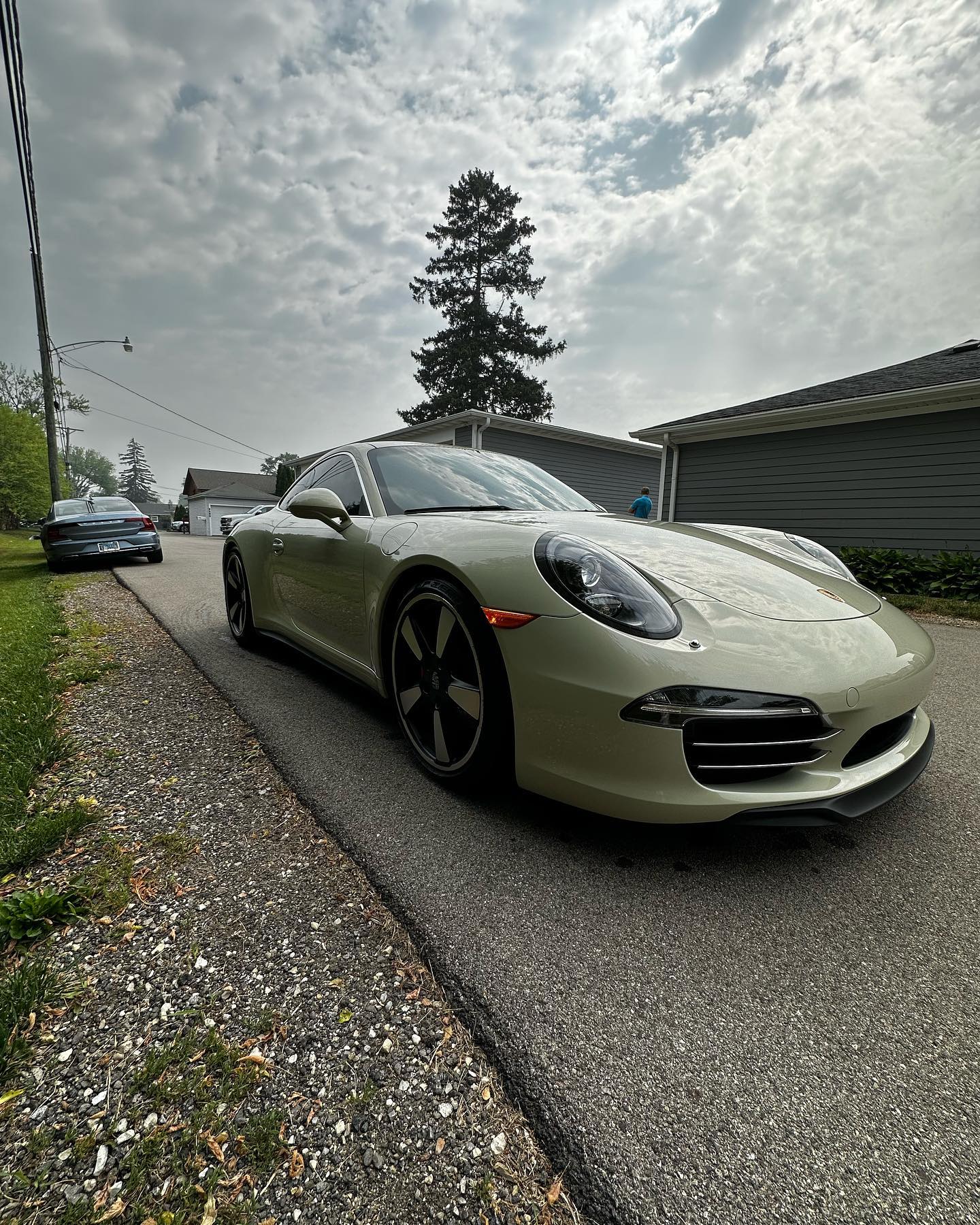 Freshly detailed Porsche 911 in the driveway