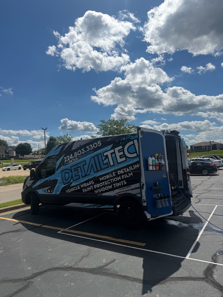 Detail Tech mobile van open with detailing supplies and equipment on board