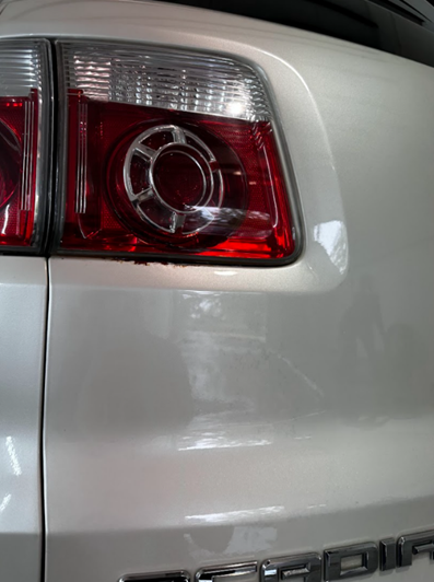 Same vehicle panel after iron decontamination, clean and rust-free