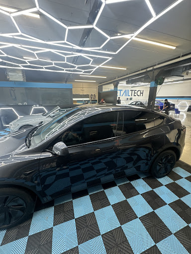 Black Tesla with paint protection film at the Detail Tech shop