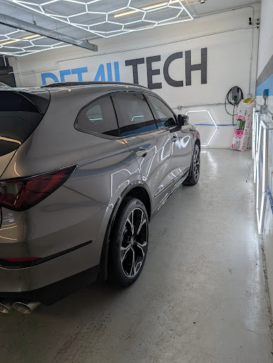 Grey Acura MDX tinted at the Detail Tech shop