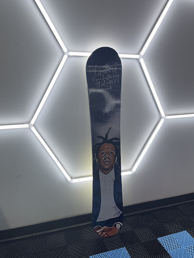 Custom vinyl-wrapped snowboard on display at Detail Tech