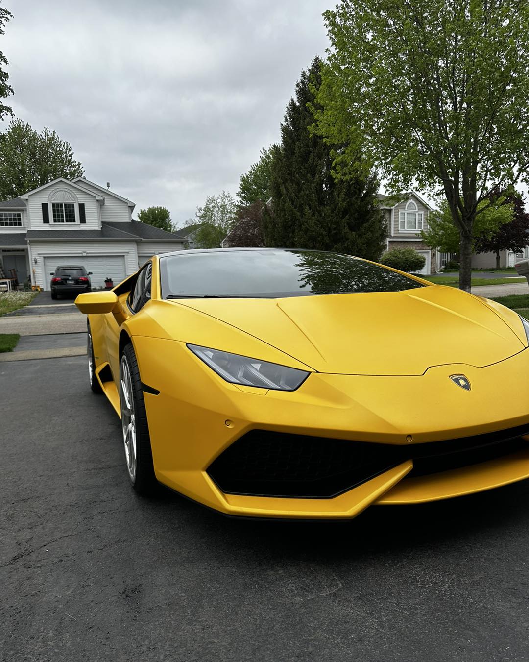 Satin yellow wrapped Lamborghini Huracan by Detail Tech